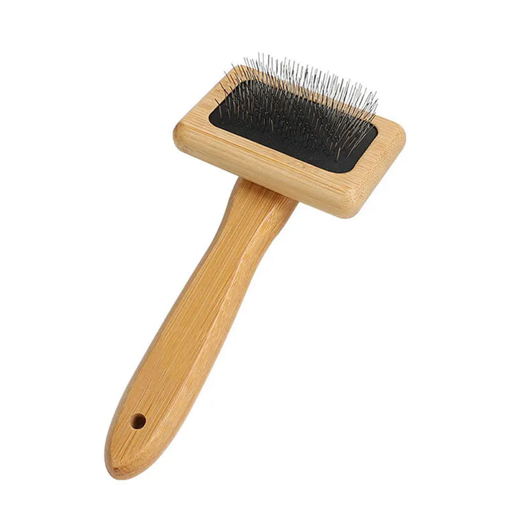 Eco-Friendly Bamboo Pet Grooming Brush for dogs and cats, sustainable and gentle grooming tool.