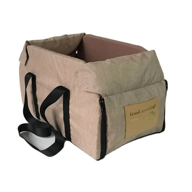 Nonslip Pet Travel Booster Seat on car armrest with plush interior for small to medium pets.