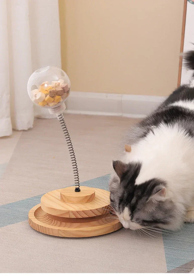 Interactive Cat Turntable Solid Wood toy with spring-loaded design, engaging cats.