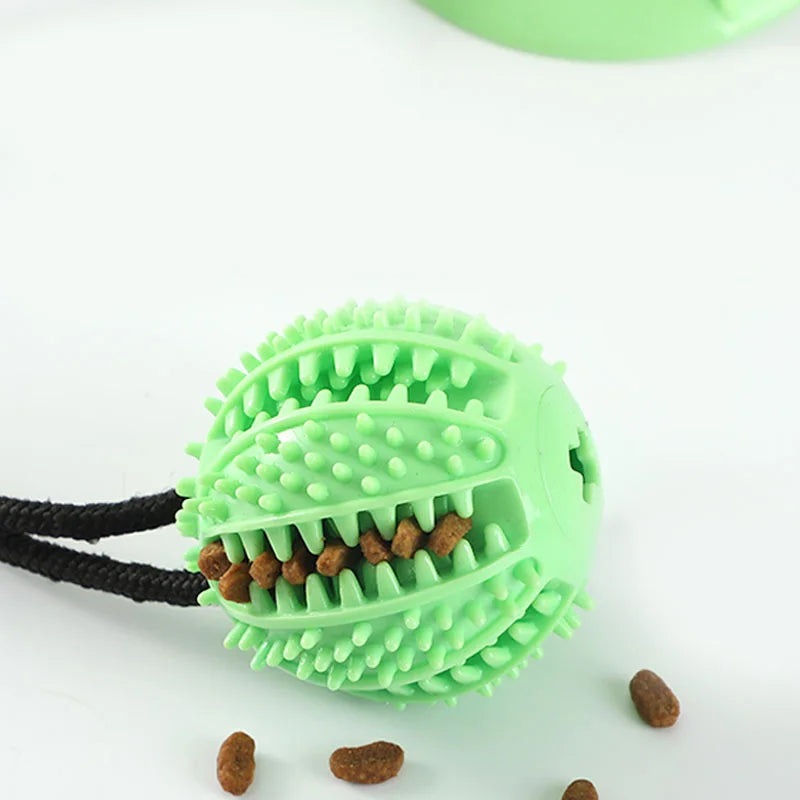 Load image into Gallery viewer, Interactive Suction Cup Dog Toy with Sound and Treat Dispensing - Durable Rubber Ball for Training and Tug-of-War Fun
