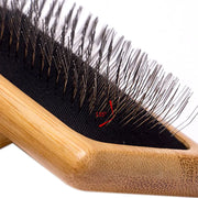 Eco-Friendly Bamboo Pet Grooming Brush for dogs and cats, sustainable bamboo handle with soft needles.