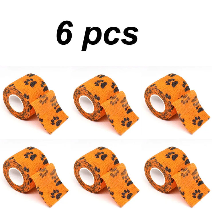 Eco-Friendly Pet Paw Wraps 6-Pack, self-adhesive bandages with paw prints, orange color, biodegradable material.