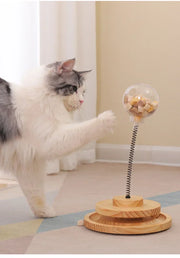 Interactive Cat Turntable Solid Wood toy with cat playing.