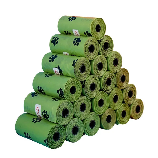 EcoScent Biodegradable Pet Waste Bags stacked with paw print design and dispenser included.