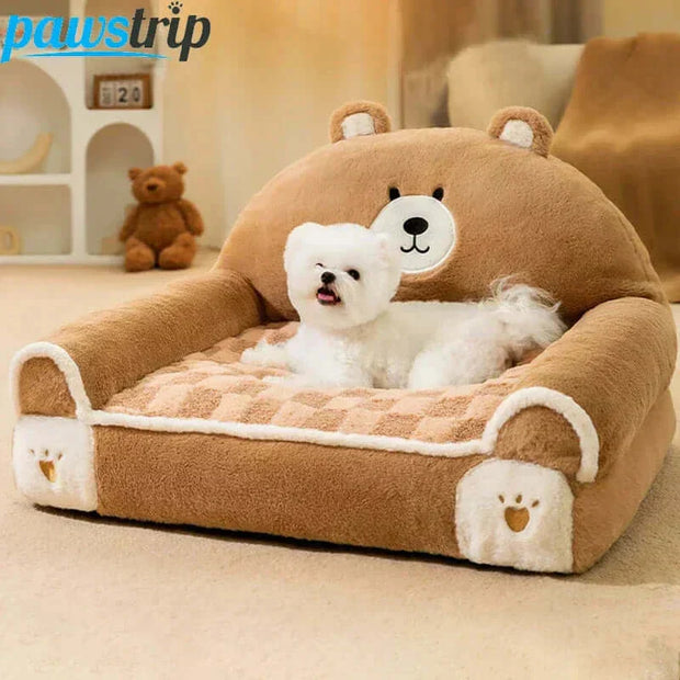 Small dogs and cats plush sleeping bed with raised edges and bear design.